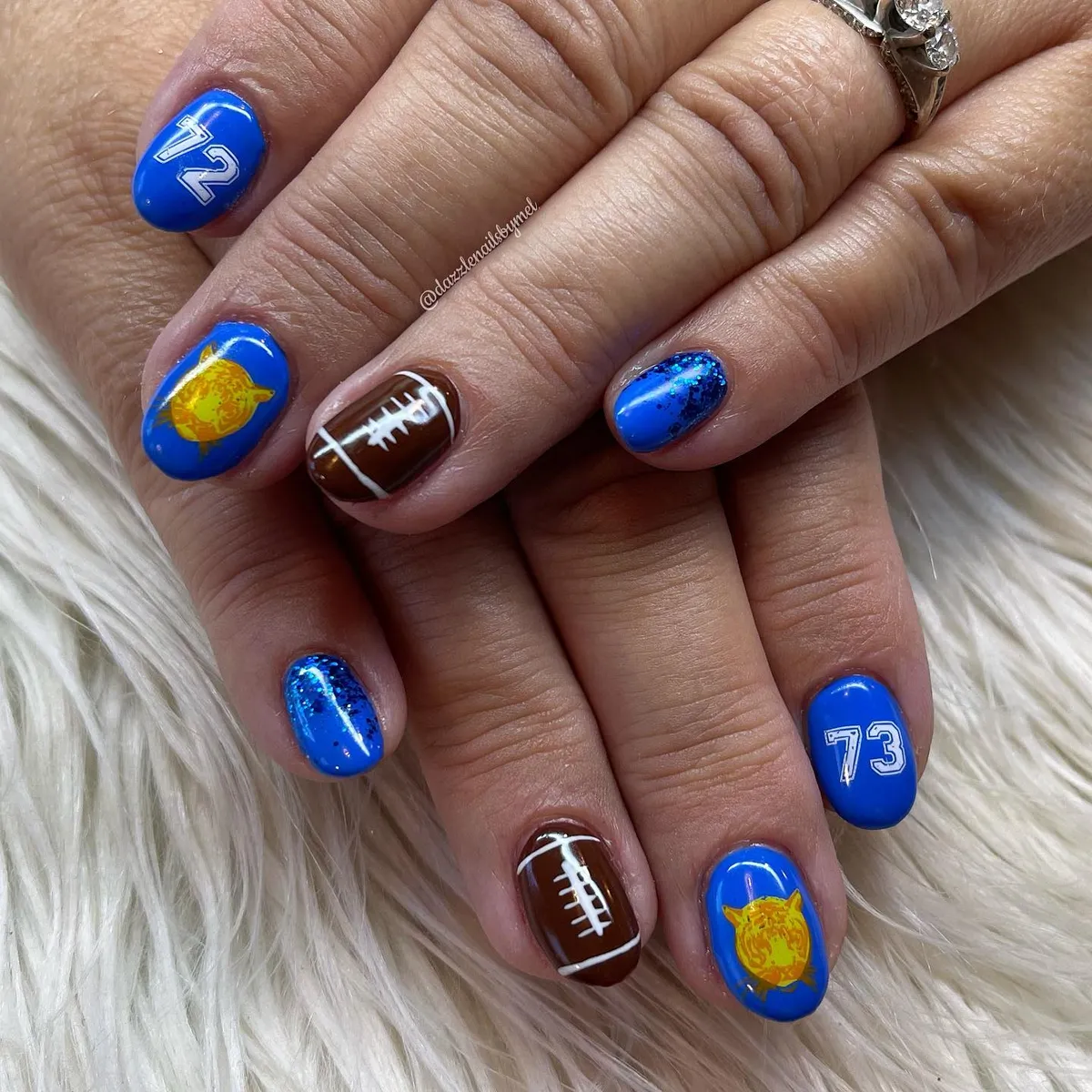 Bright blue set with jersey numbers, football-lace accents, and glitter fades