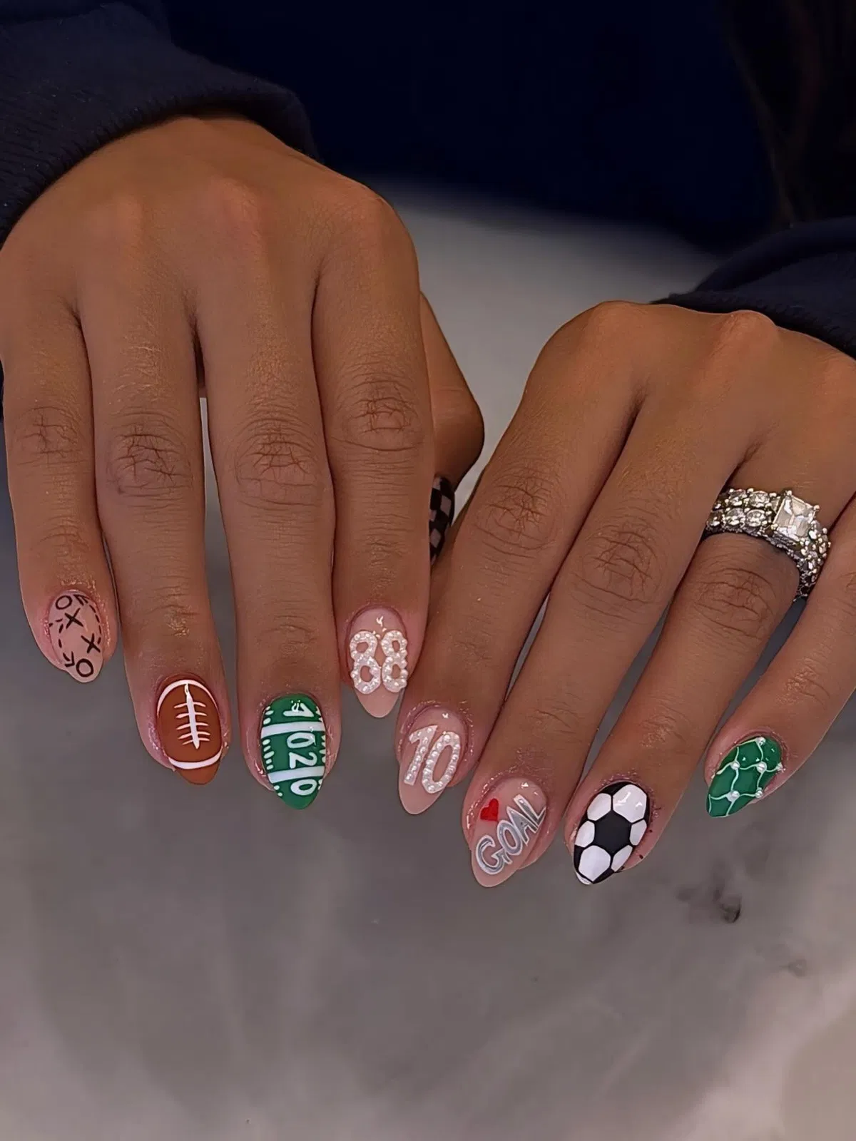 Mixed sports set: football field lines, raised numbers, “GOAL,” and soccer motifs