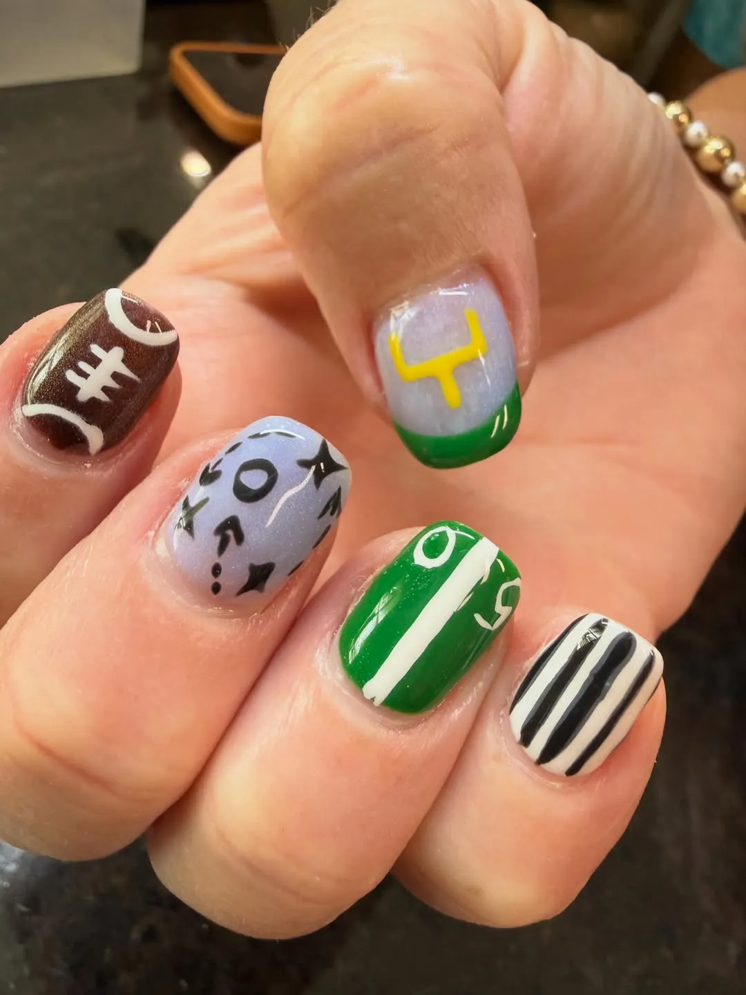 Mixed football icons with stripes and partial numbers