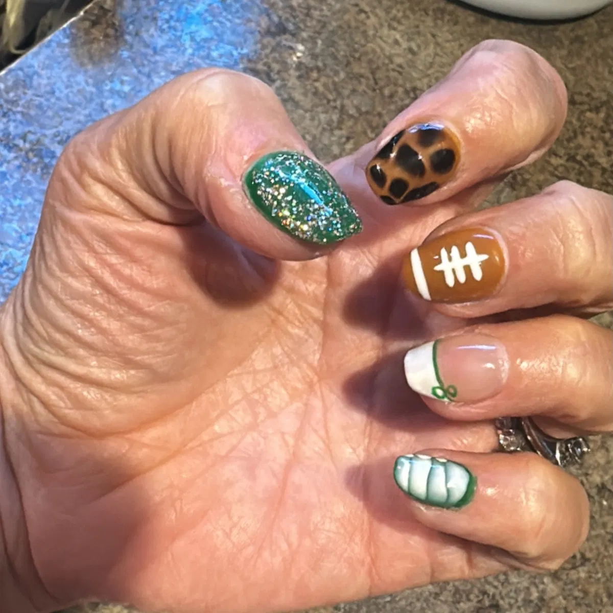 Green glitter mix with leopard spots and lace-style accent