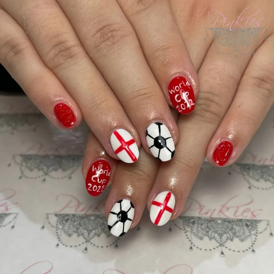 Red glitter with soccer ball panels and “World Cup 2022” text
