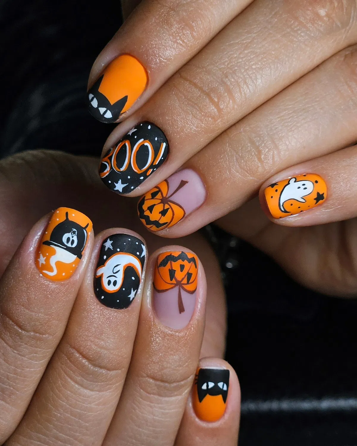 Orange-and-black set with “BOO!” text and pumpkins
