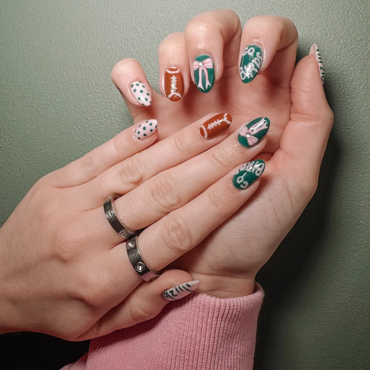 Green glitter accents with bows, polka dots, and football motifs
