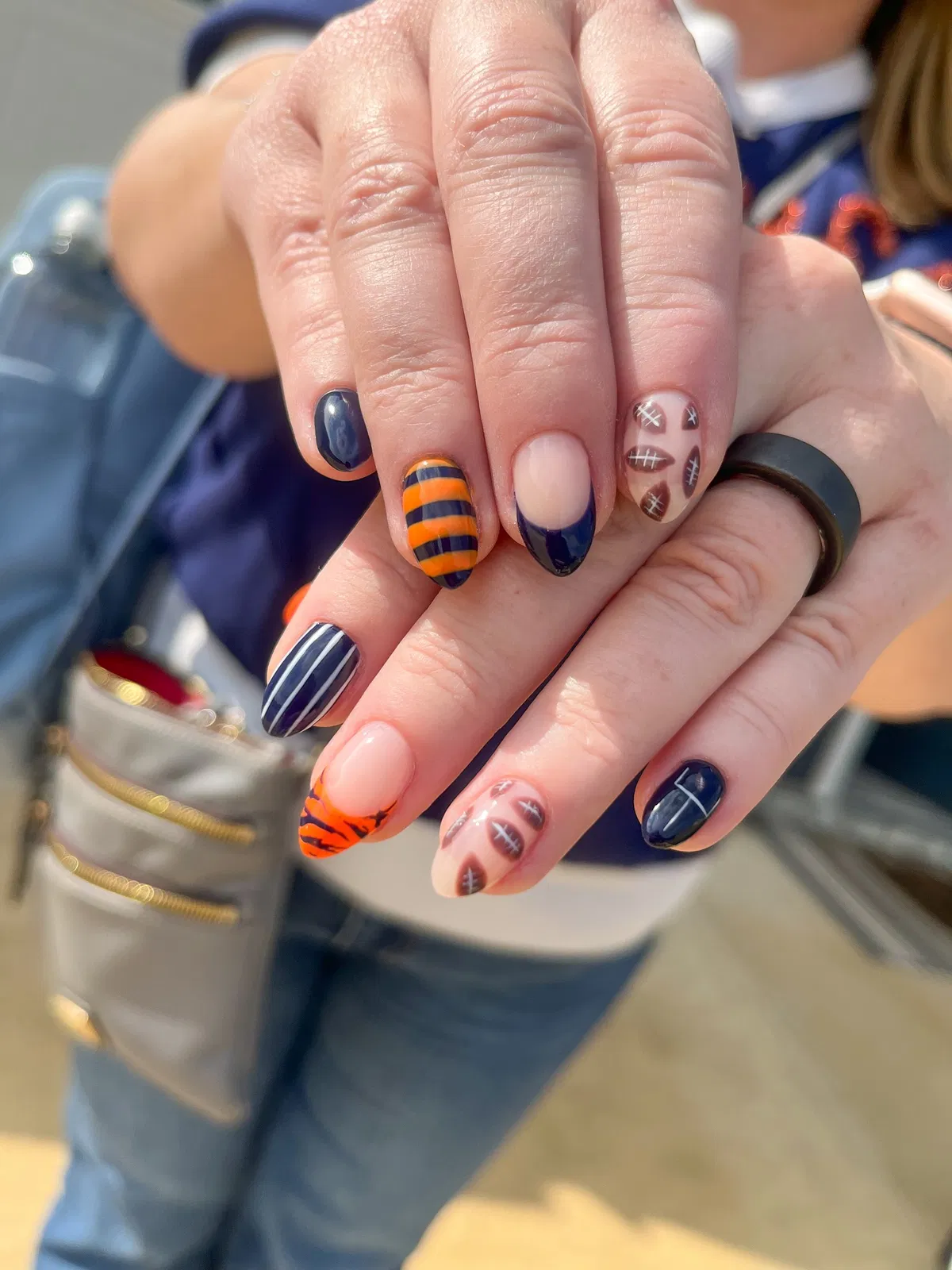 Navy and orange stripes with football-pattern accents