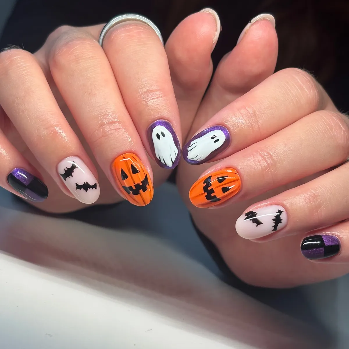 Orange pumpkins and purple ghost accents