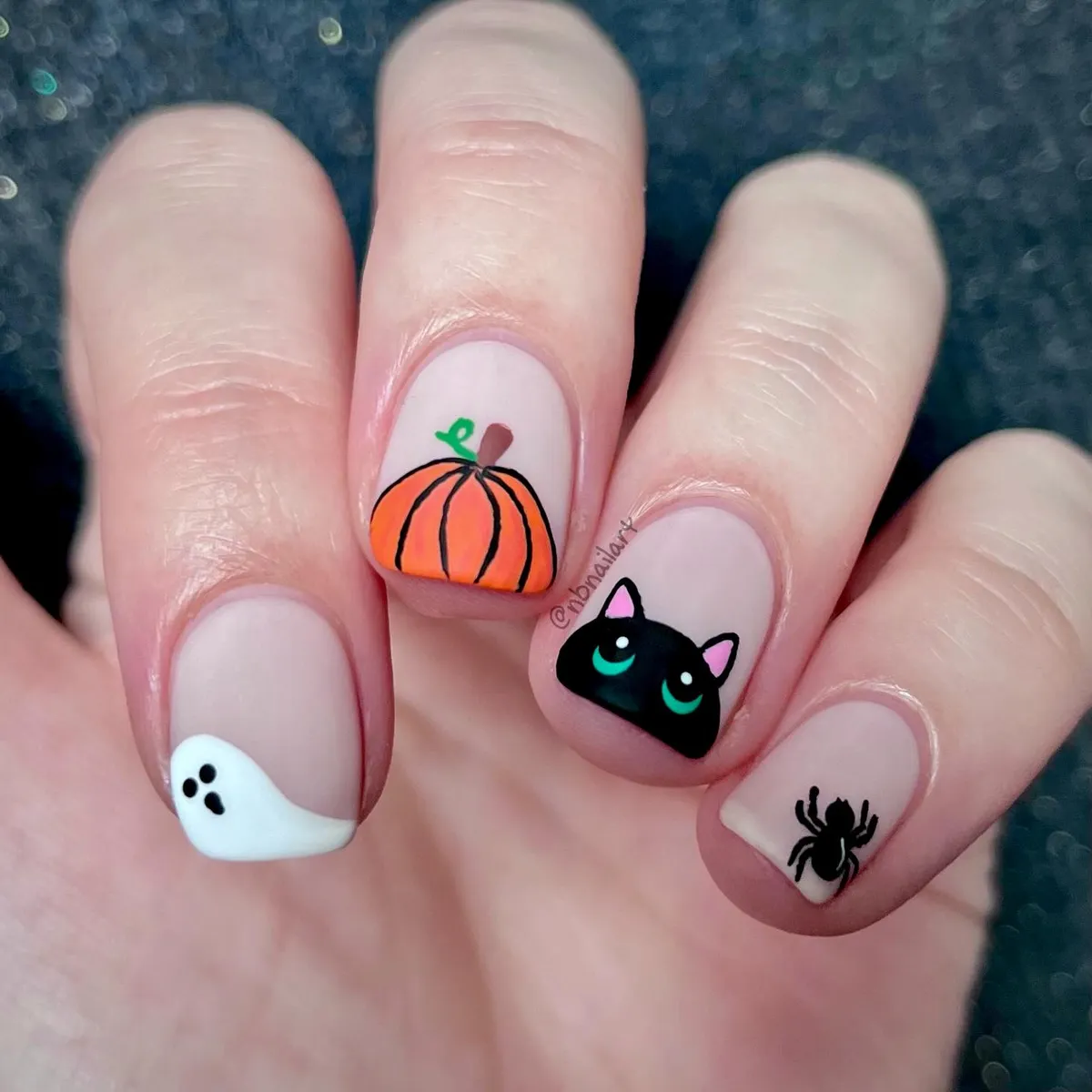 Minimal nude base with pumpkin, cat, ghost, and spider