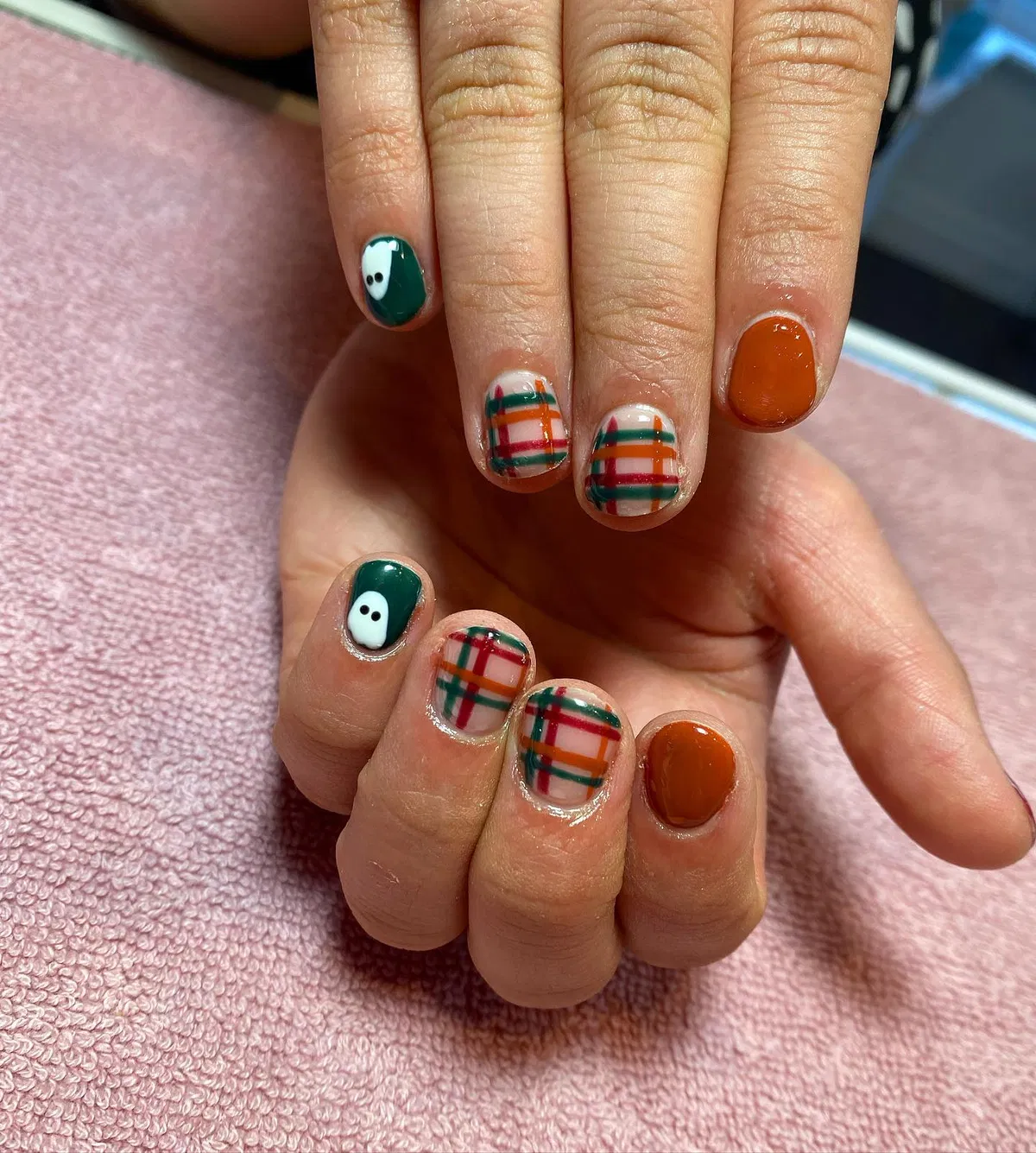 Dark green ghosts with multicolor plaid and burnt-orange solids
