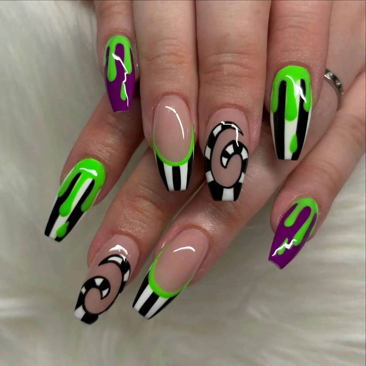 Neon green drips with stripes and spiral accents