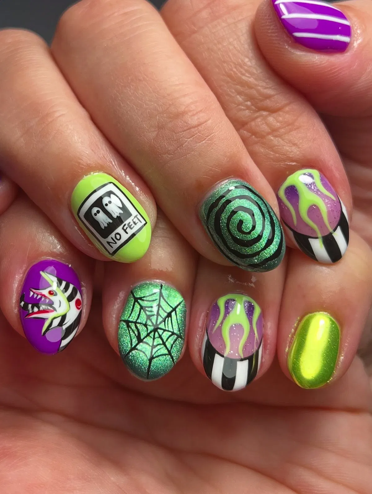 Neon green and purple spooky mix with “NO FEET” text and webs