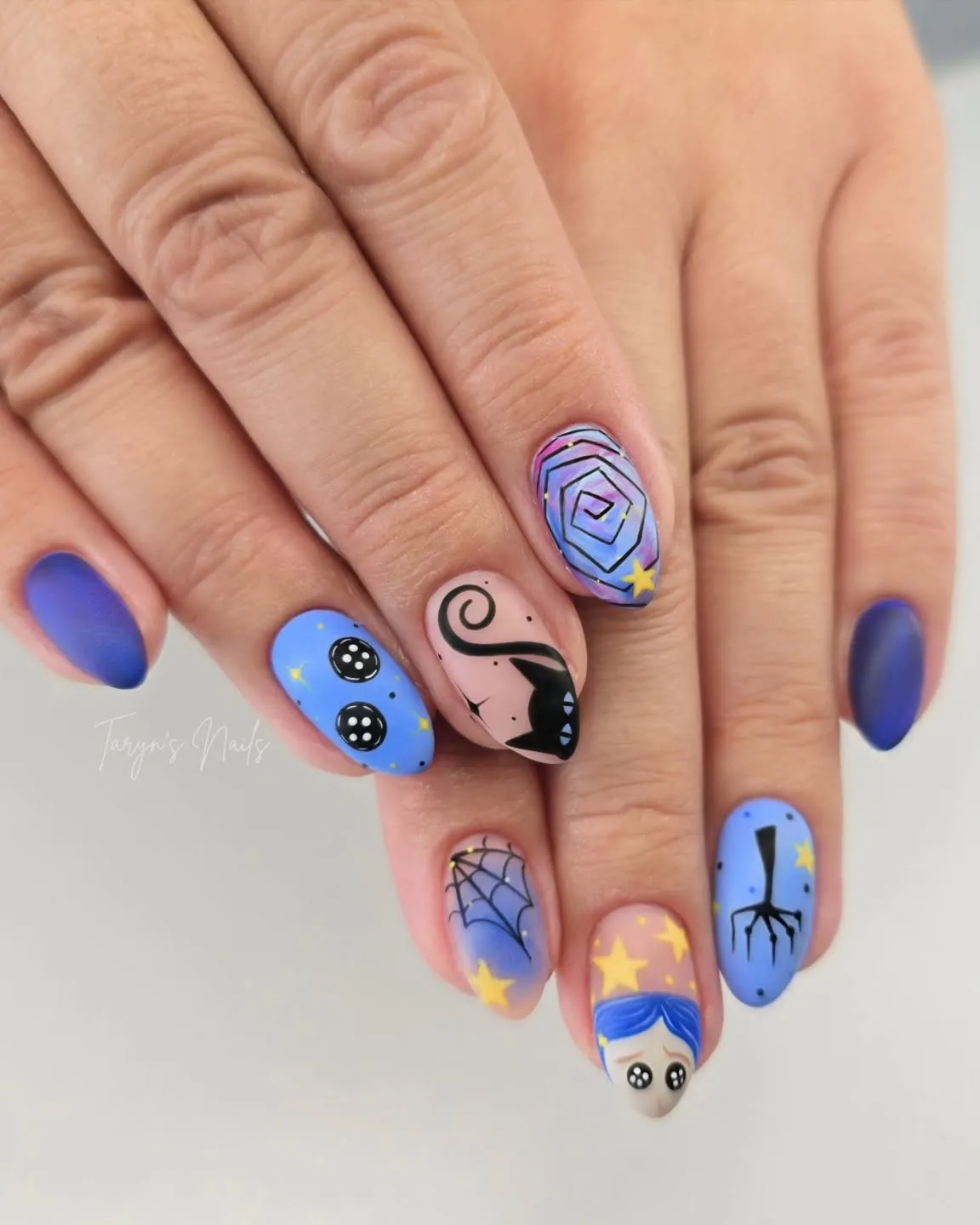 Matte blue and nude set with webs, stars, and illustrated accents
