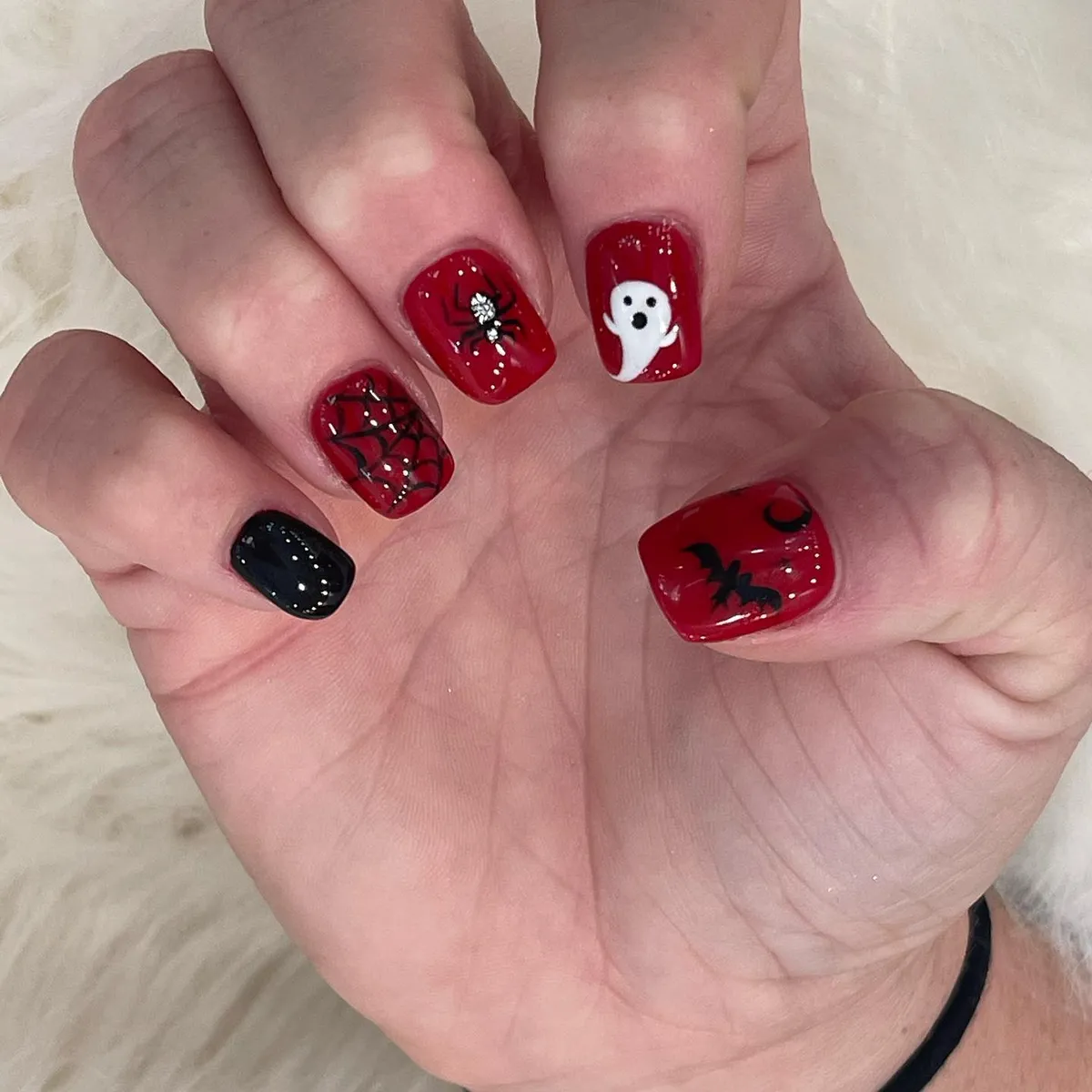 Deep red set with spiderweb, spider, ghost, and bat