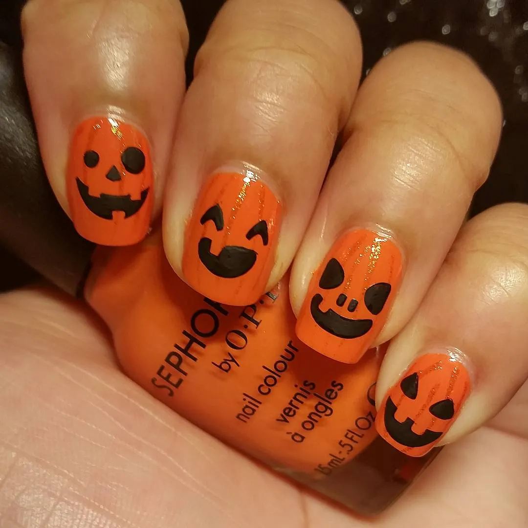 Orange tips with black drips
