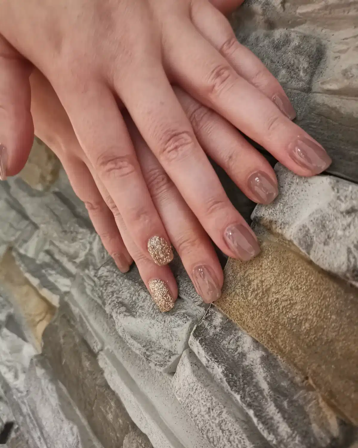 Sheer Taupe Nails with Gold Glitter Accent Fingers