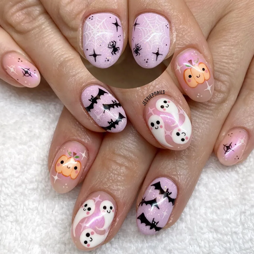 Pastel pink-lavender set with webs, bats, ghosts, and pumpkins