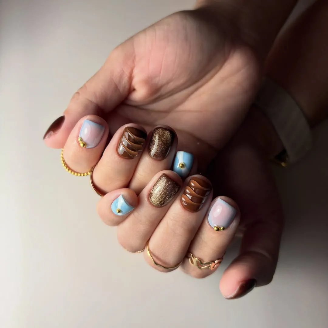 Brown and blue mix with gold studs and wavy stripe accents