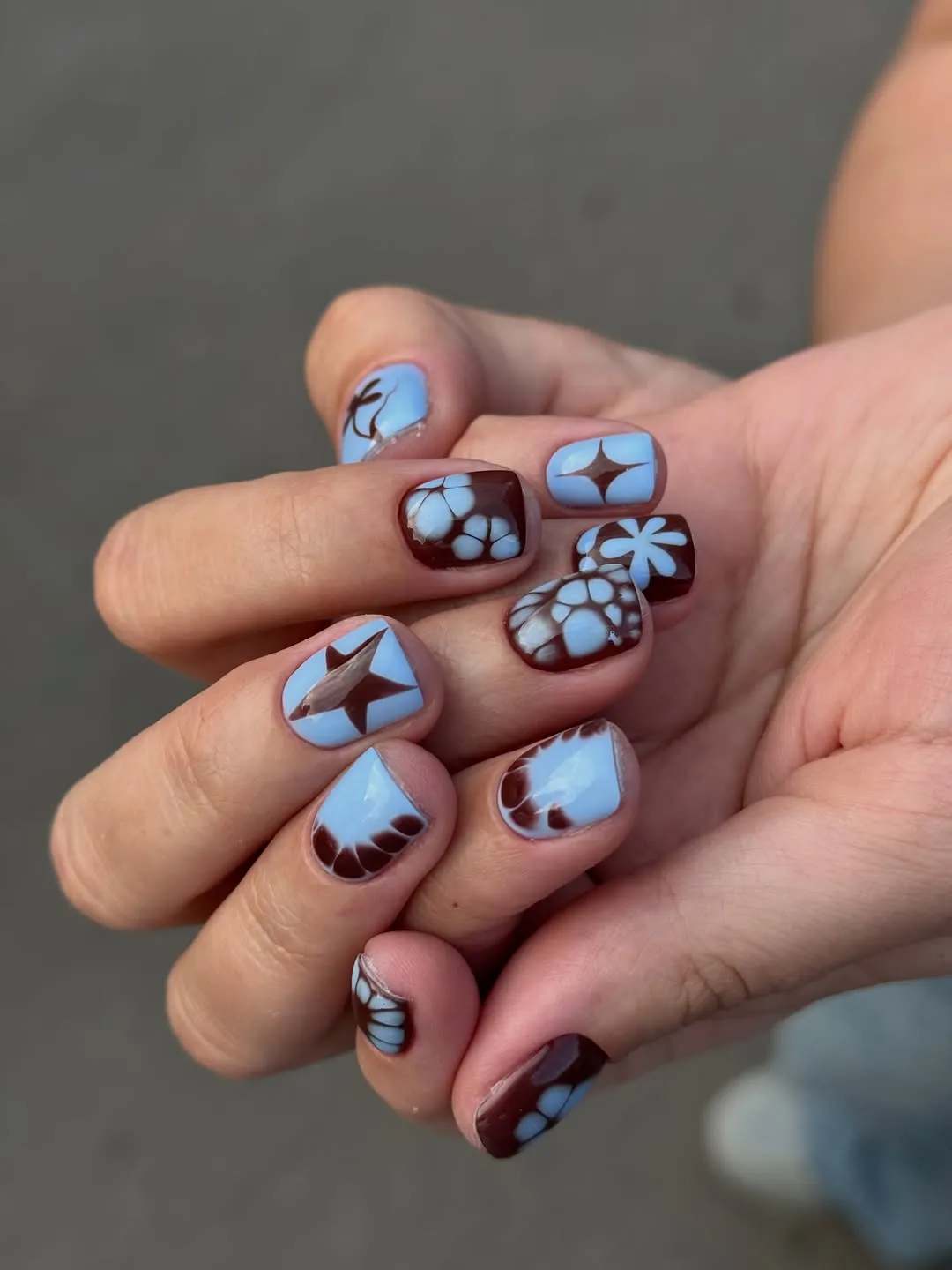 Light blue and brown mix with flowers and star motifs