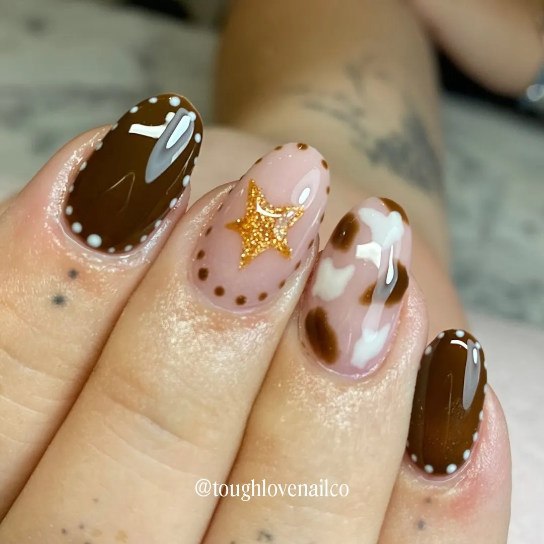 Brown perimeter dots with a gold star and abstract patches