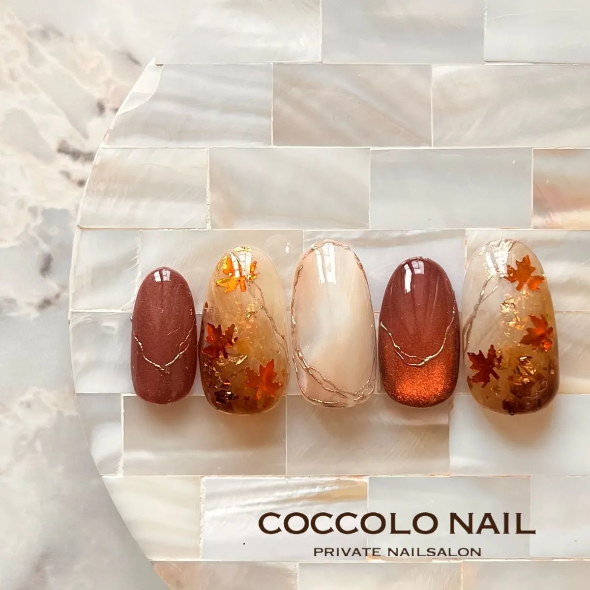 Brown and copper set with embedded leaf confetti