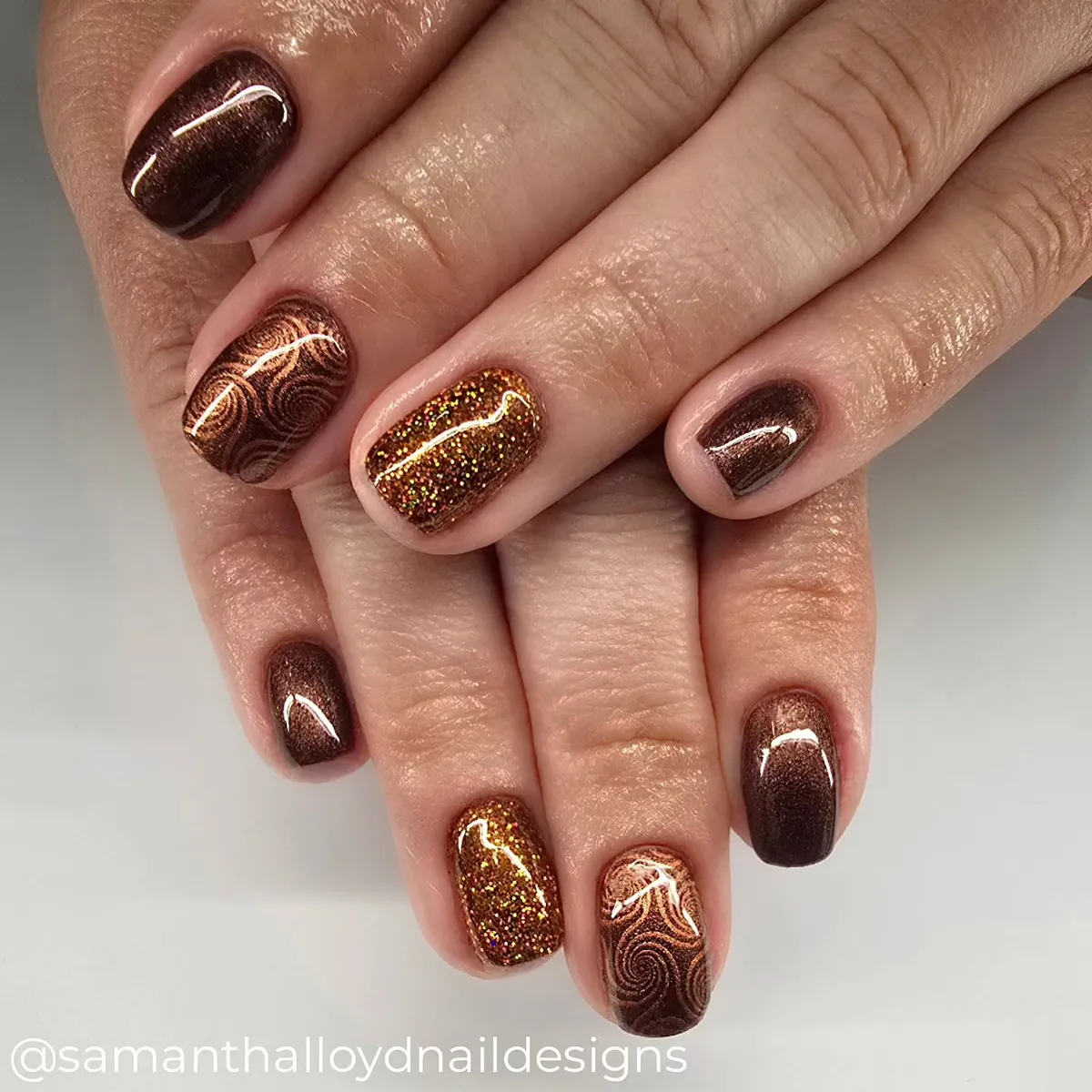 Dark brown and copper swirls with gold glitter accent