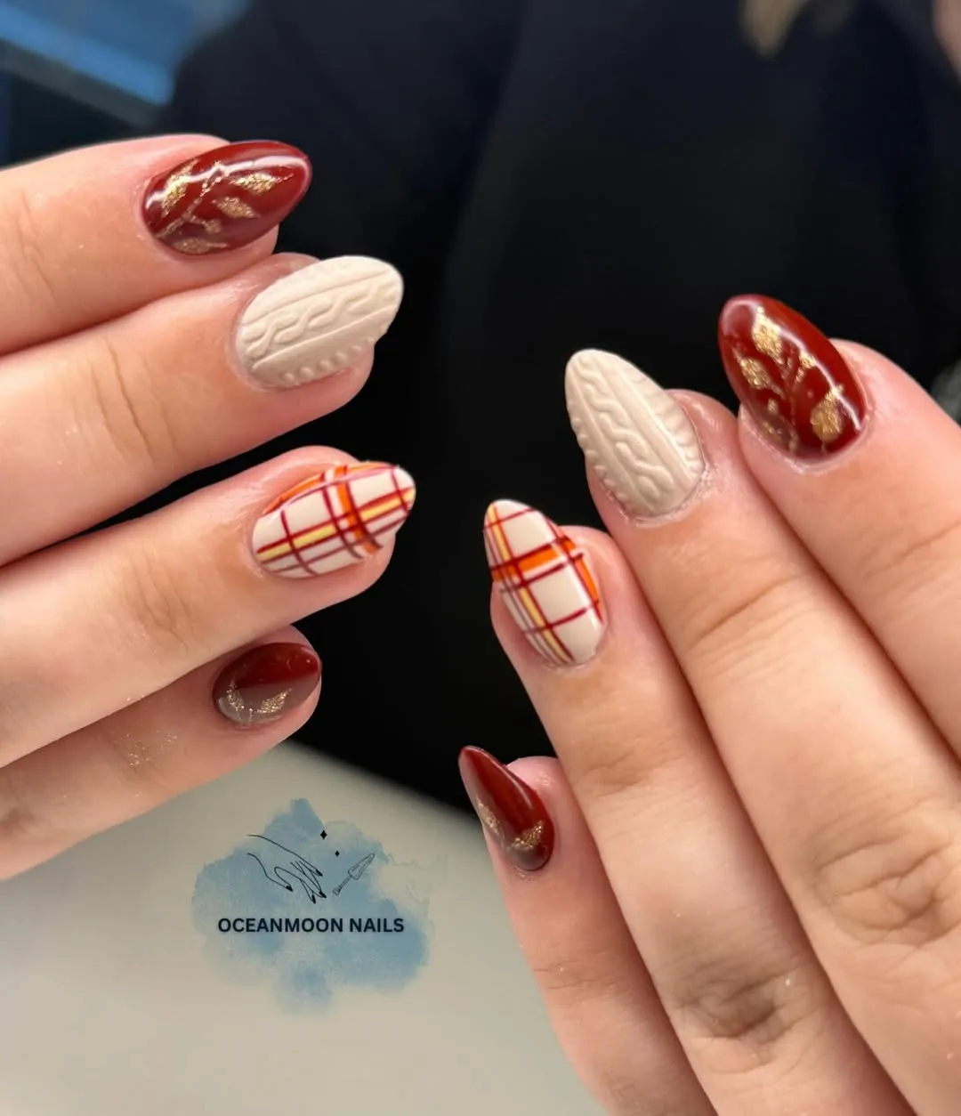 Cream plaid with cable-knit texture and red-gold accents