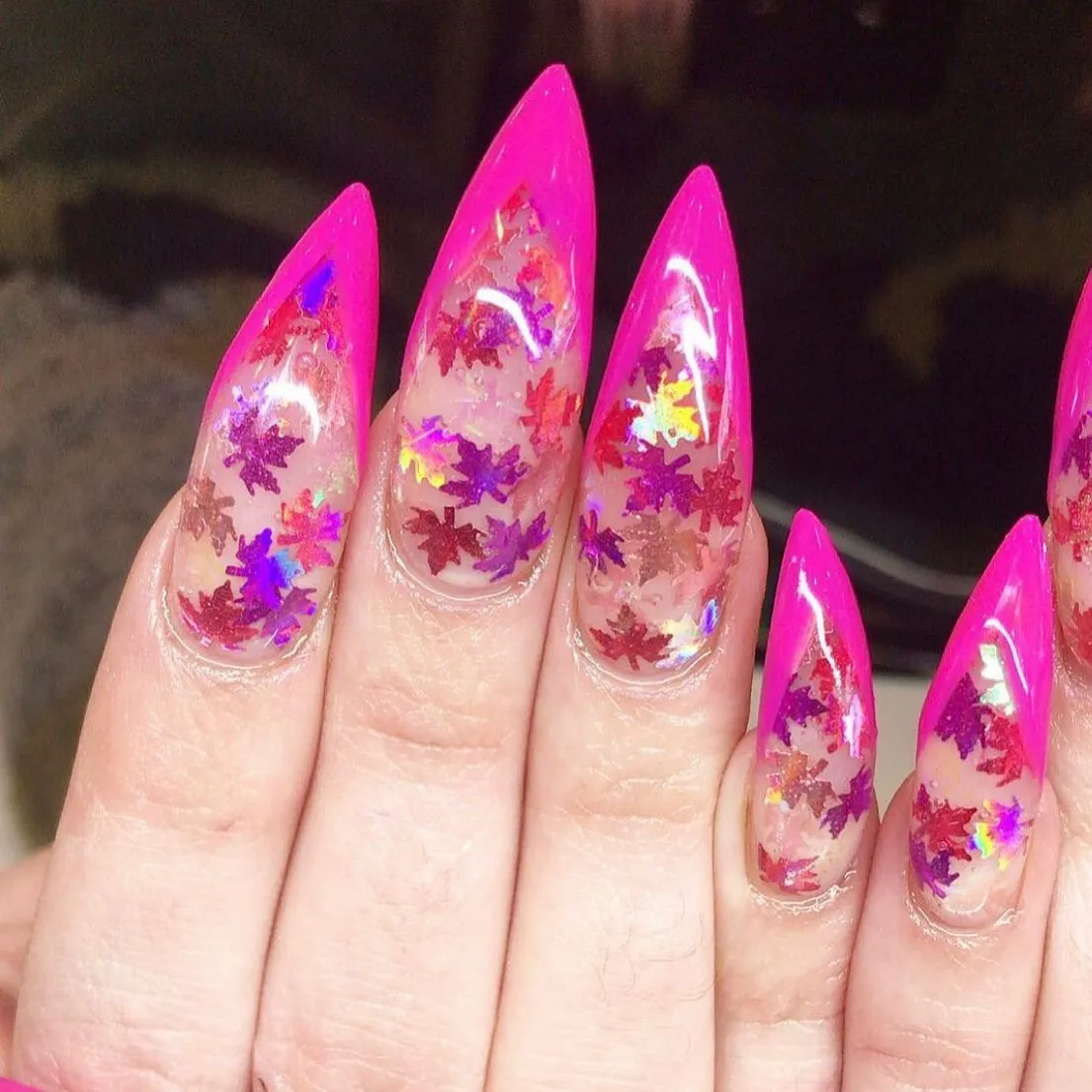 Hot pink edged stilettos with leaf confetti