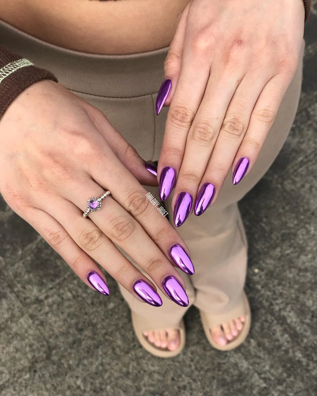 Mirror-finish metallic purple almond nails