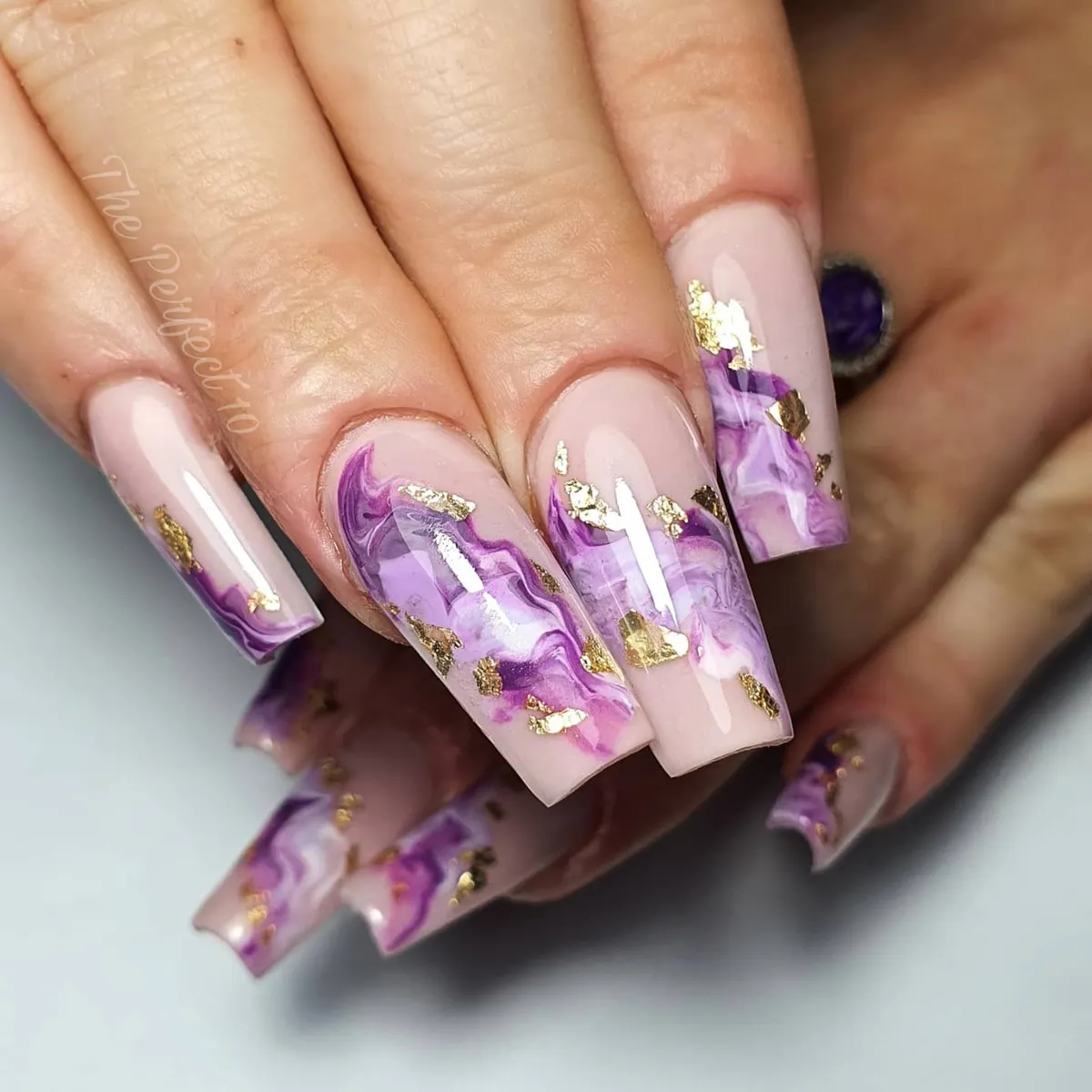 Nude-to-plum marbled tips with gold foil accents