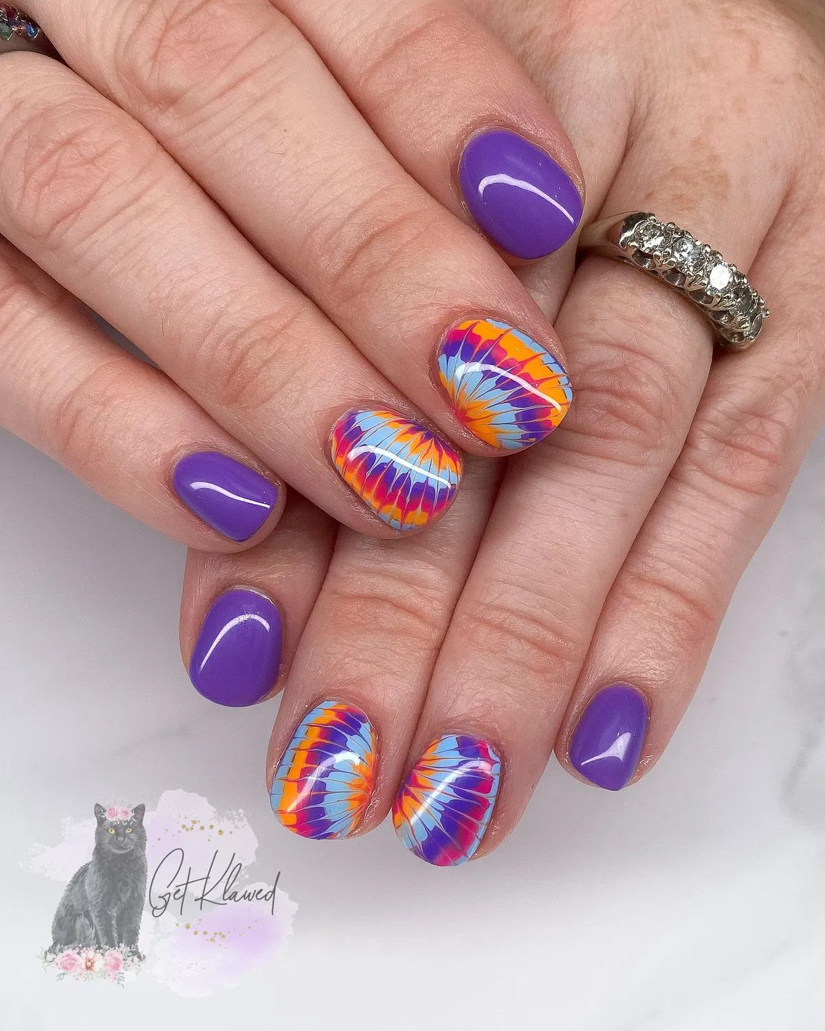 Medium purple with bold multicolor radial accent nails