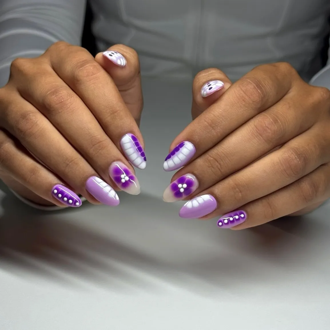 Lavender-and-white set with purple florals and raised dot accents