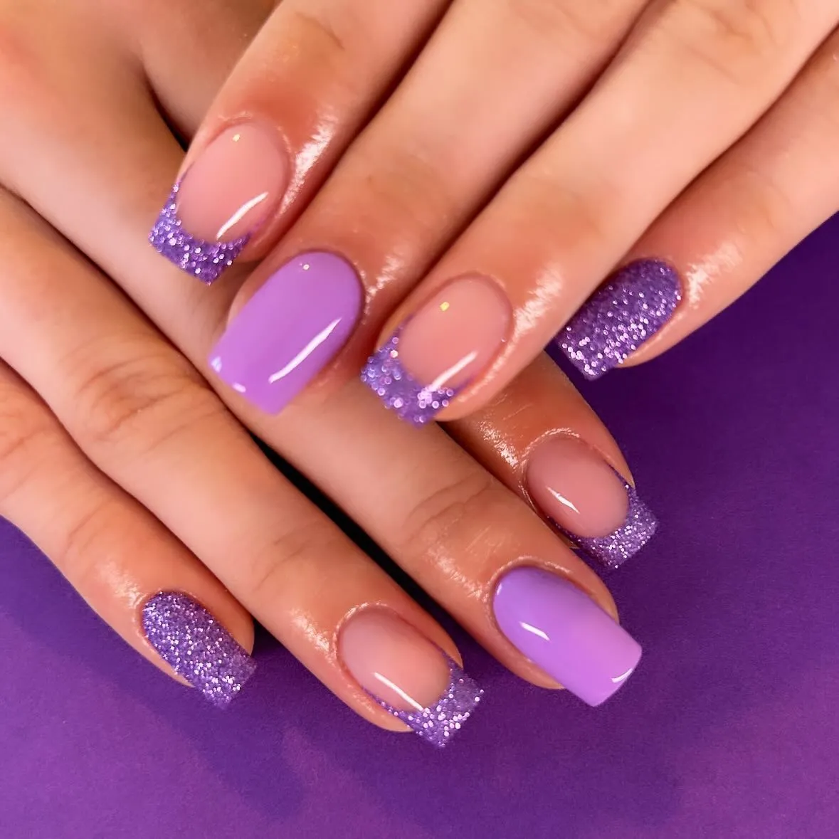 Purple glitter French tips with lavender solid nails