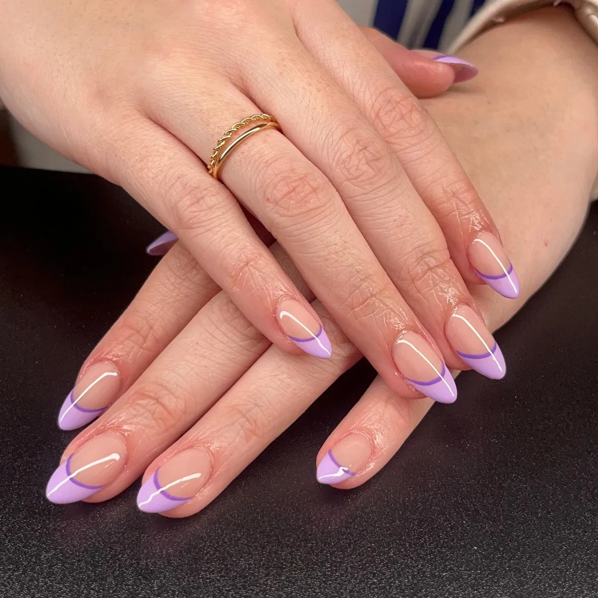 Minimal lavender French tips with curved line detail