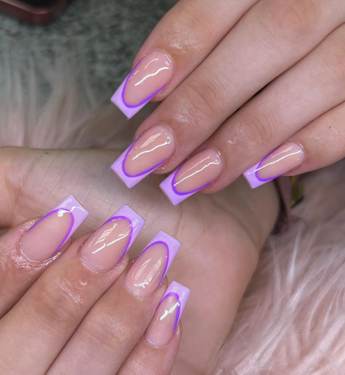 Outlined lavender French tips on long square nails