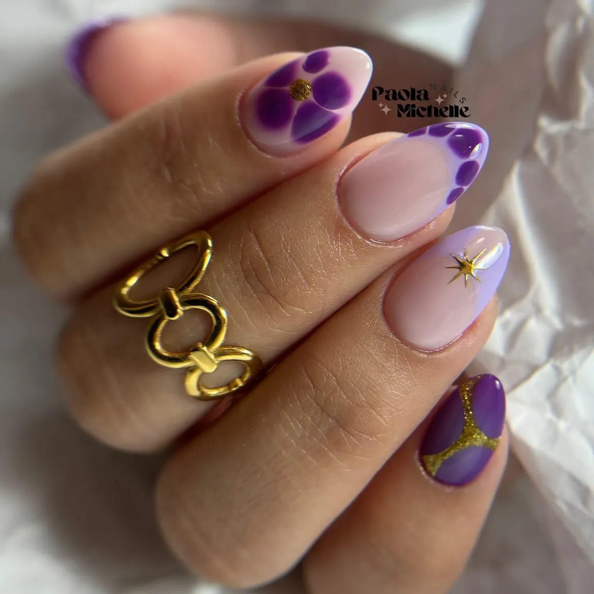Purple floral tip accents with gold star charm and glitter-line detail