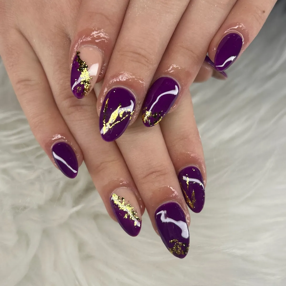 Glossy plum almonds with gold accents