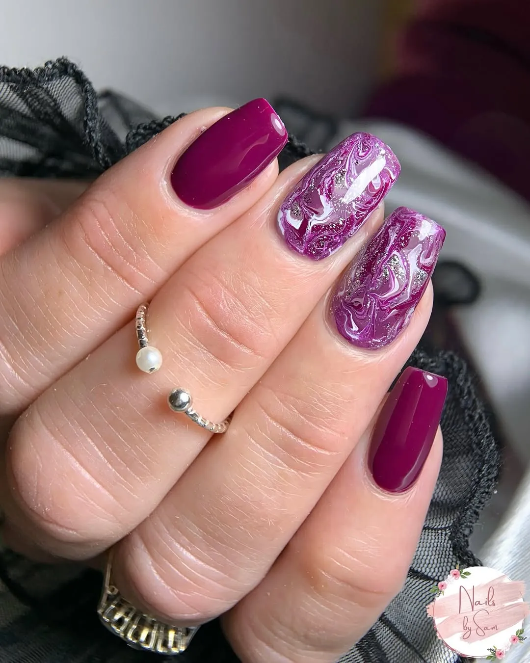 Deep plum squares with purple-white swirls