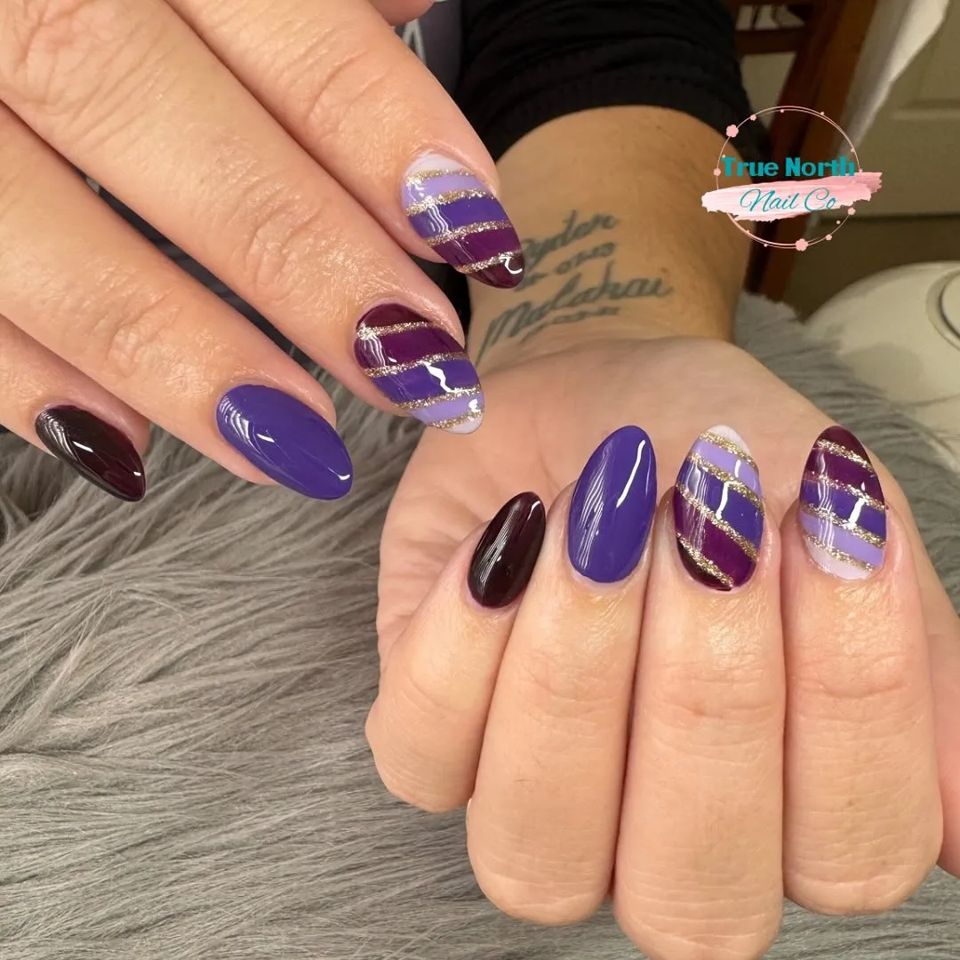 Diagonal striped plum and lavender with gold lines