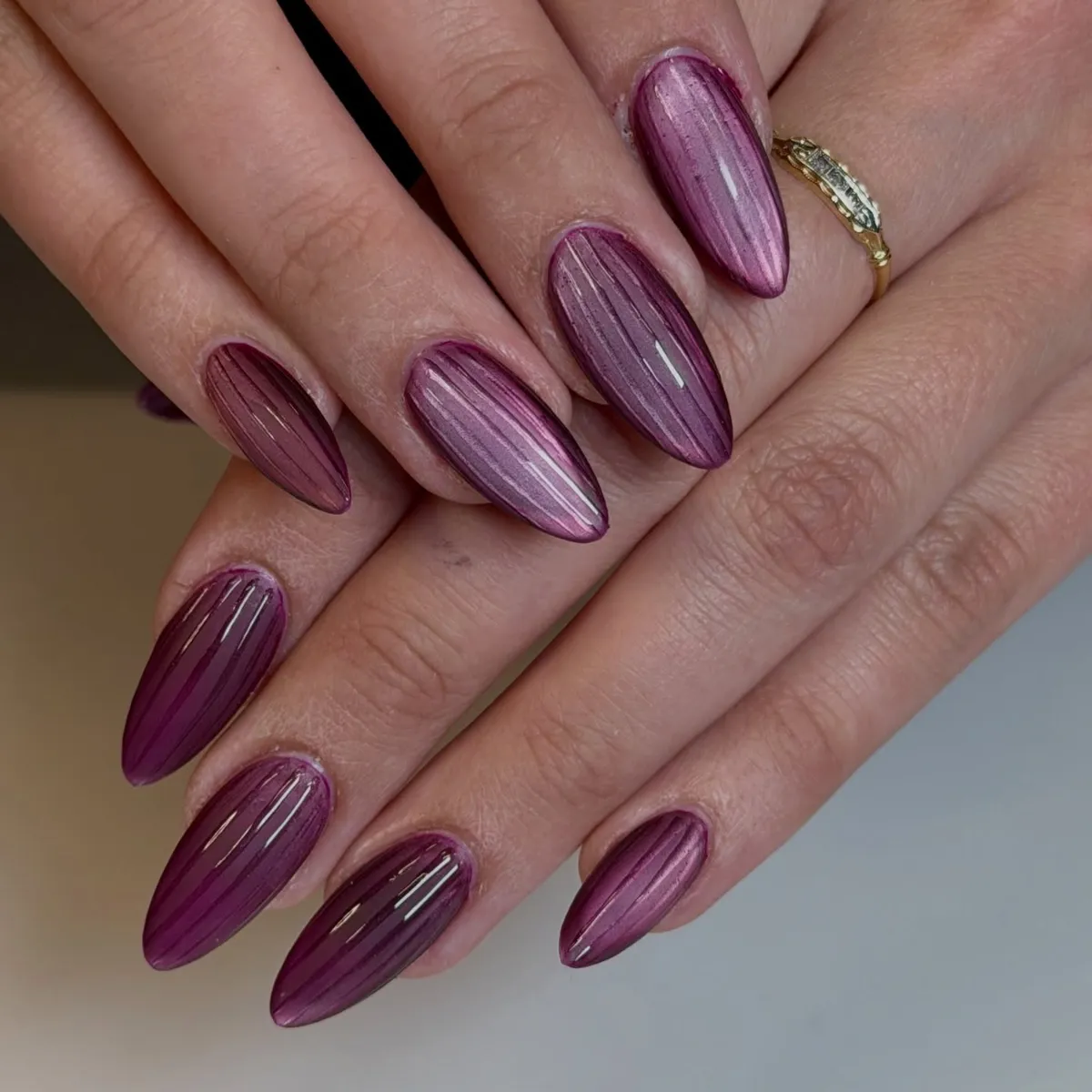 Plum-mauve vertical stripe nails