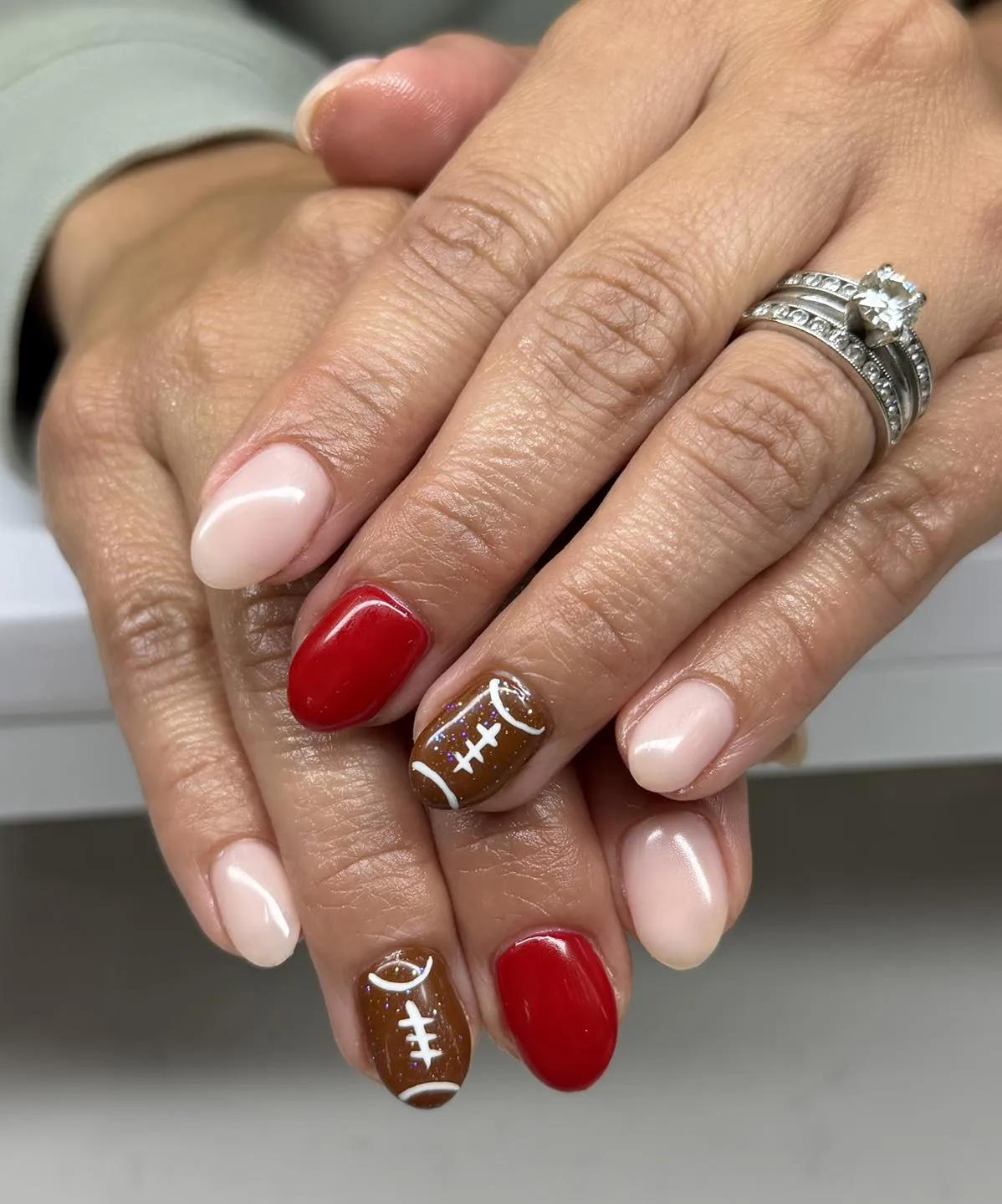Minimal red and nude with brown football-lace accents