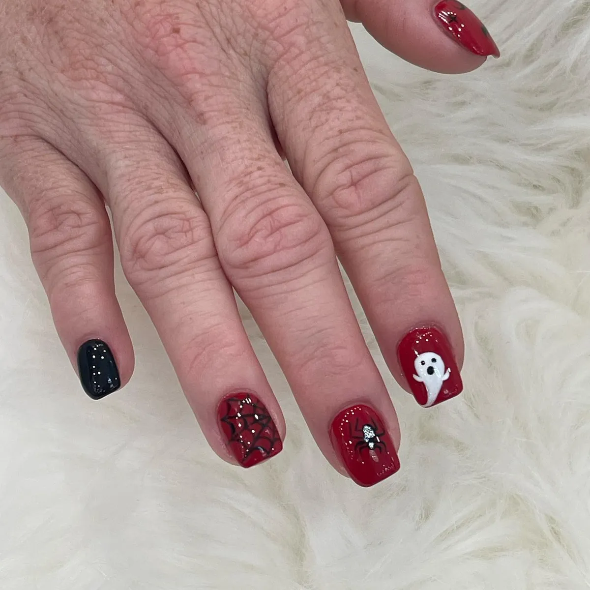 Red and black set with web, spider, and ghost accent
