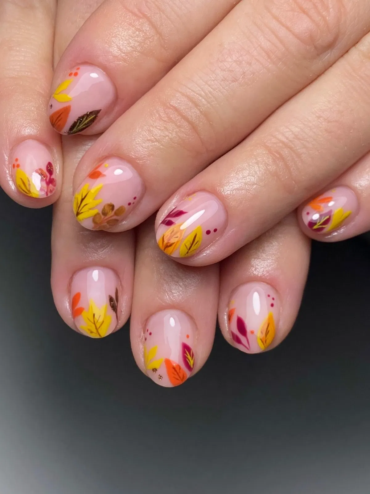Sheer pink base with multicolor leaf details