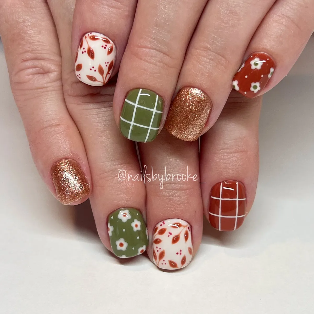 Olive, rust, and copper glitter with grids and florals