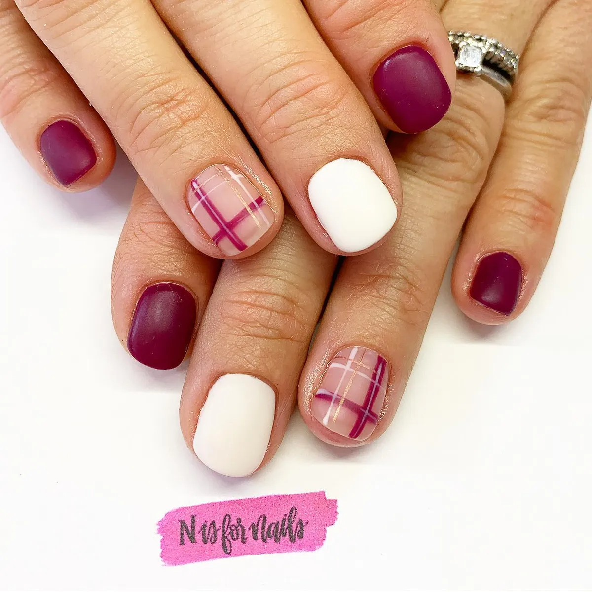 Plum and white with magenta-and-gold plaid accents