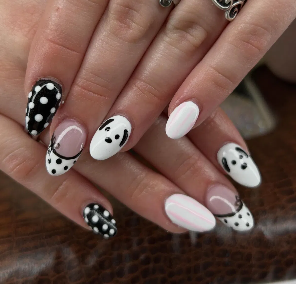 Black-and-white polka dots with cartoon face accents