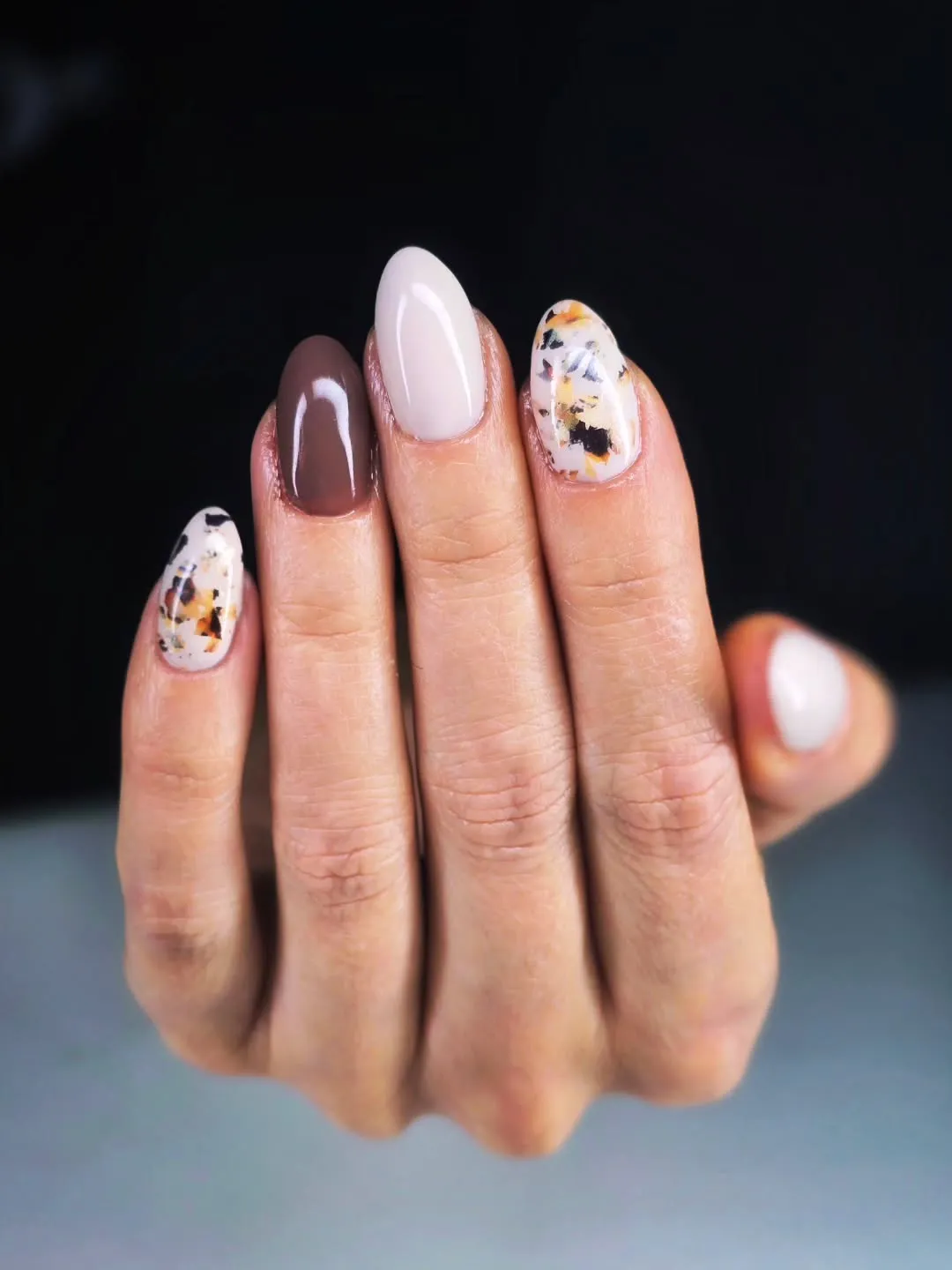 Brown and pale pink with speckled flake accents