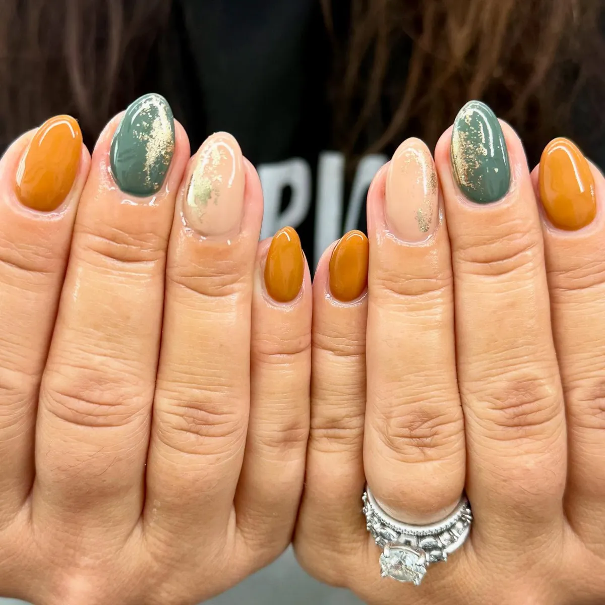 Mustard, teal-green, and nude with gold foil accents