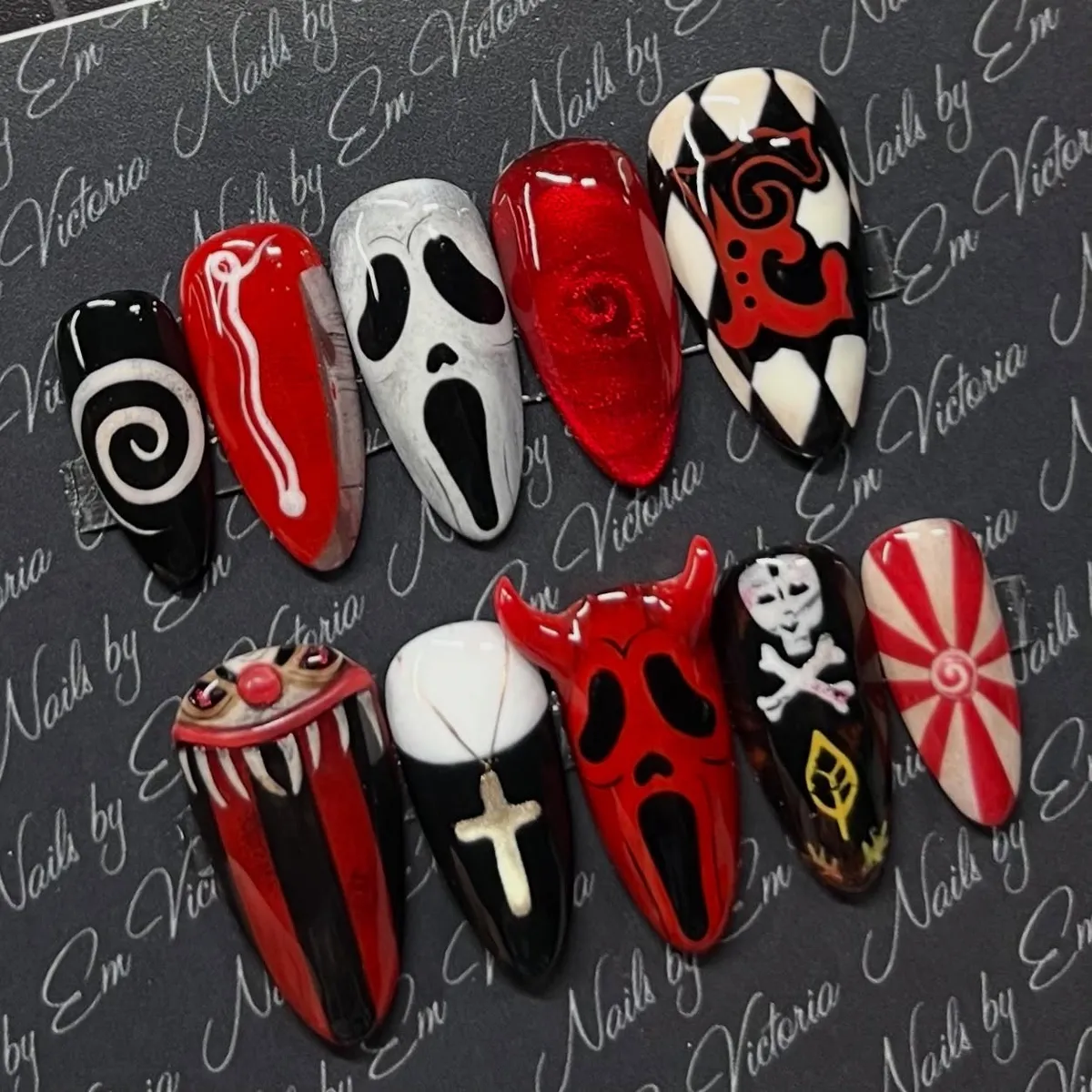 Press-on horror mix with spirals, ghosts, skulls, and bold patterns