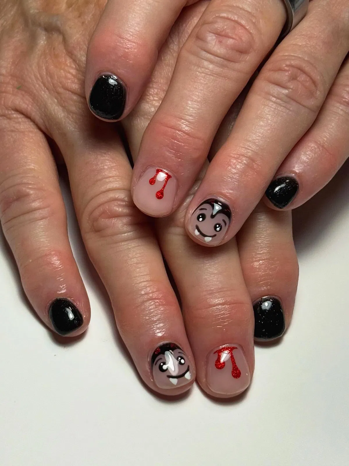 Short black sparkle with cartoon fang faces