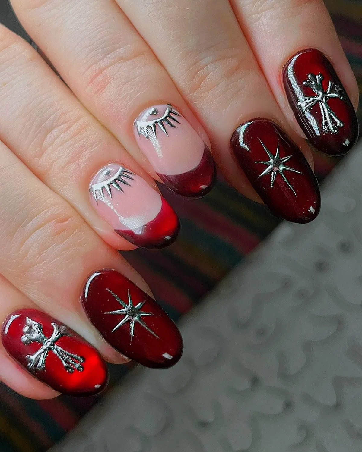 Burgundy with Silver Starbursts and Eye Motifs