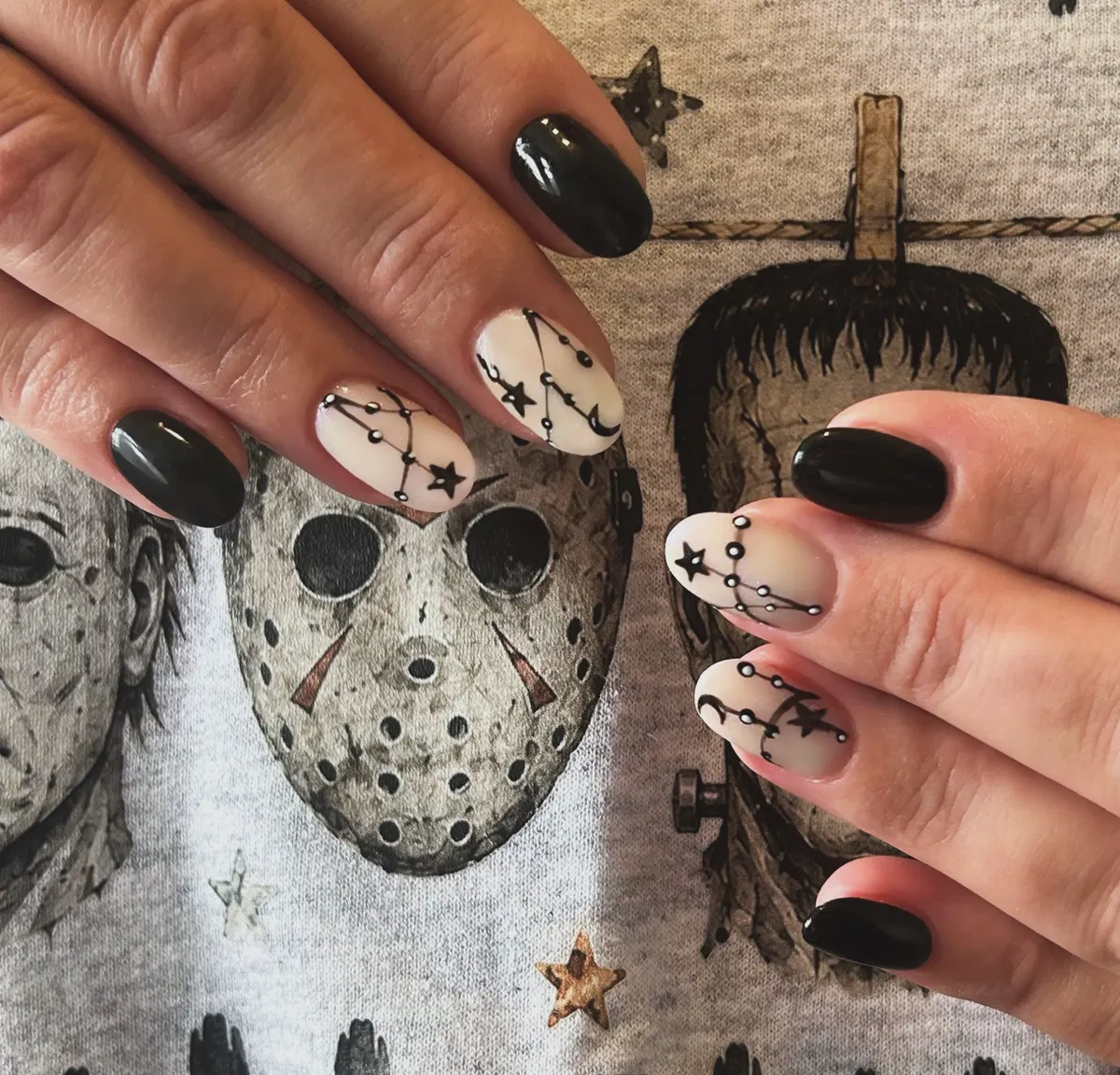 Black solids with nude constellation-and-star accents