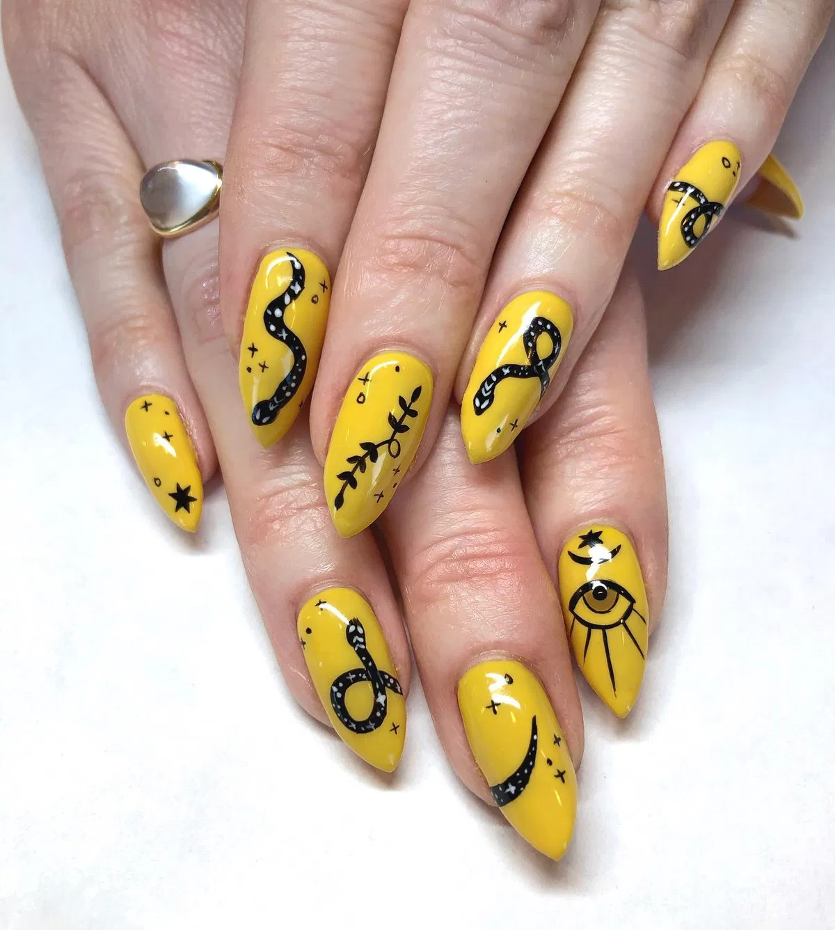Bright yellow set with black snakes and eye graphic